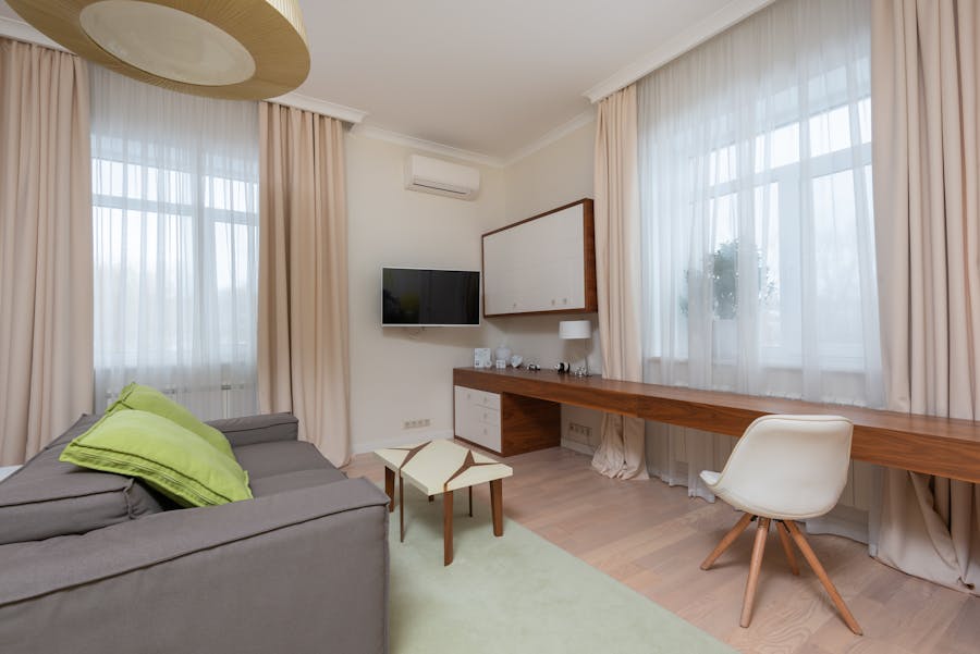 a gray sofa bed in a living room